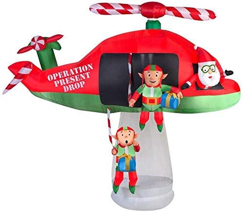 Gemmy 114.17 in. D x 57.09 in. W x 96.85 in. H Animated Inflatable Santa and Elves in Helicopter Scene