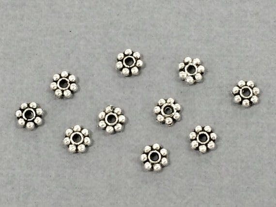 4mm & 5mm silver plated daisy spacer beads, package contents