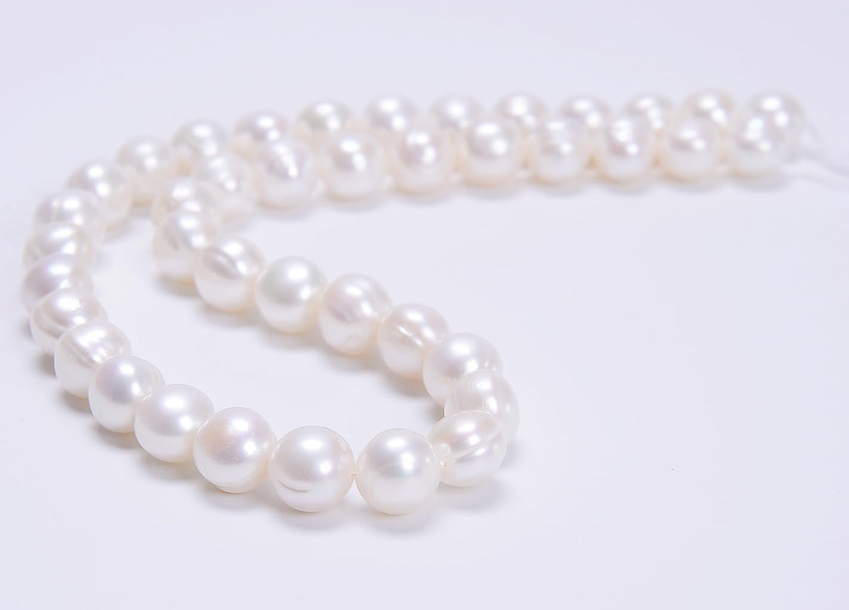 ad beads natural freshwater white pearl round beads shown in use