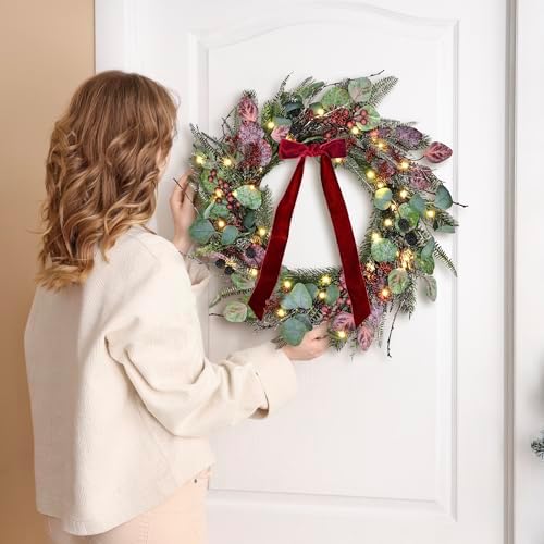 24 Inch Pre-Lit Artificial Christmas Wreath for Front Door Welcome - Realistic Frosted Eucalyptus Black Berries Red Velvet Bow - 50 LED Battery Operated Timer for Indoor Outdoor Modern Farmhouse
