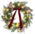 24 Inch Pre-Lit Artificial Christmas Wreath for Front Door Welcome - Realistic Frosted Eucalyptus Black Berries Red Velvet Bow - 50 LED Battery Operated Timer for Indoor Outdoor Modern Farmhouse