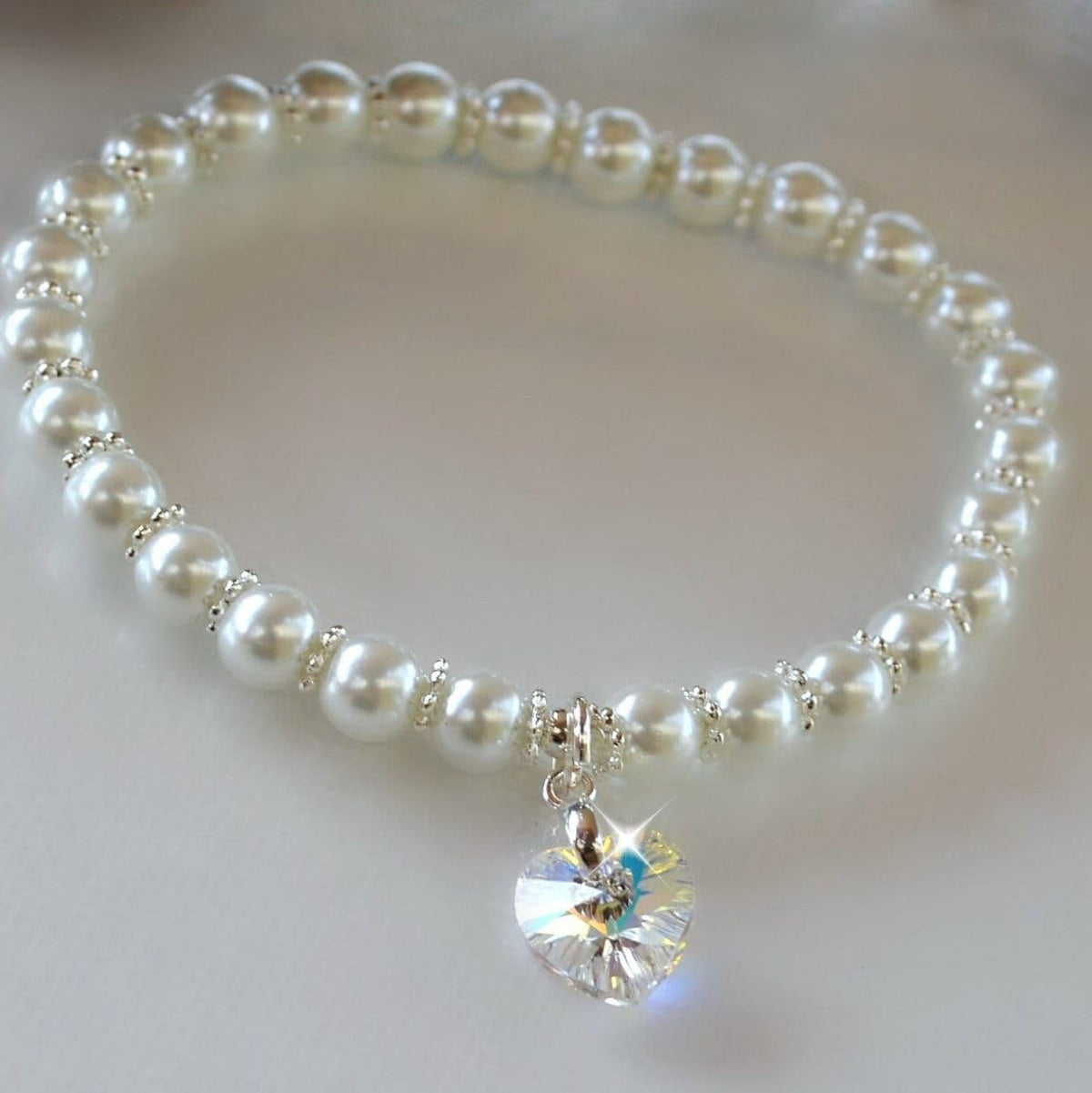 4mm & 5mm silver plated daisy spacer beads, side view