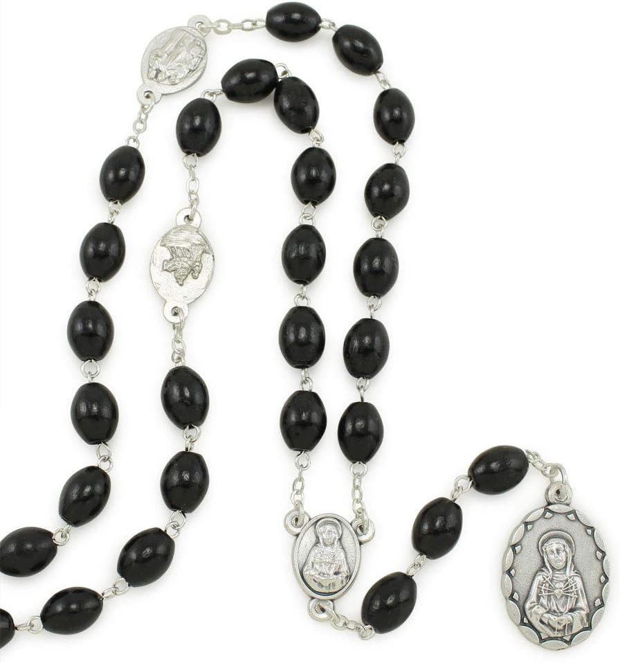 seven sorrows of mary rosary chaplet oval black shown in use