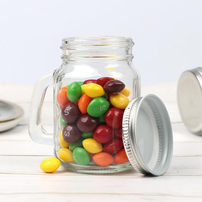 4 oz Small Mason Jar Mugs with Handle, 24 Pack Mini Glass Jars with Airtight Metal Lids, Empty Glass Mugs with Kraft Paper Gift Tag for Party Wedding Favor