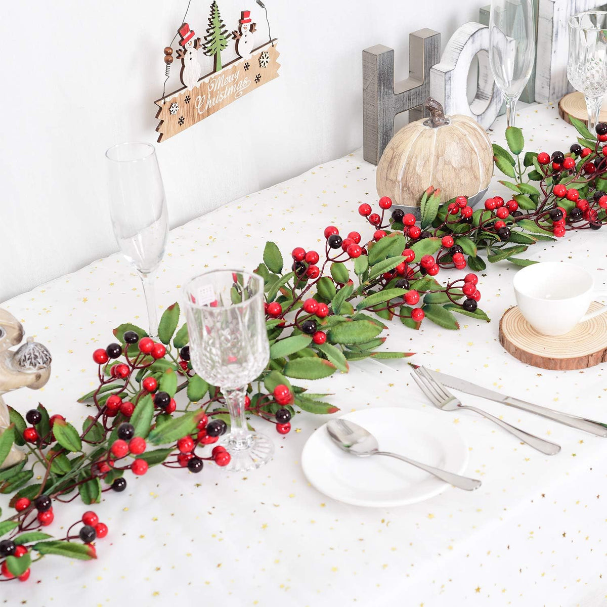 5.83 ft red berry christmas garland with pine shown in use