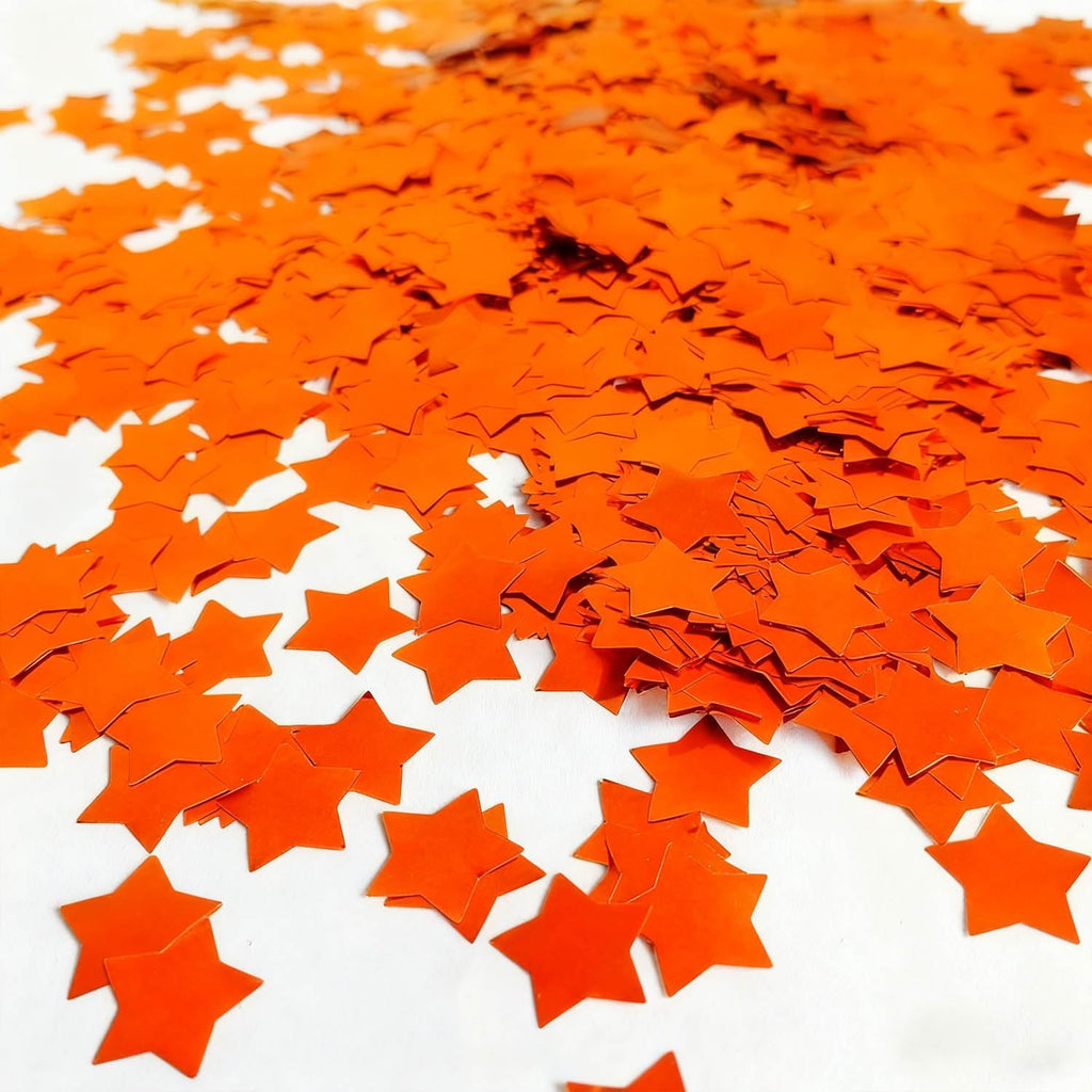 orange star confetti 0.6 inch,round orange foil confetti,shiny, close-up detail