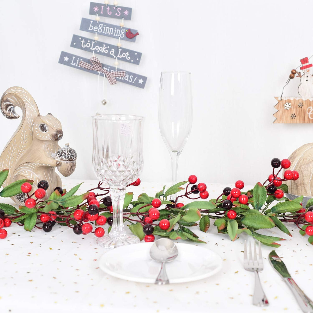 5.83 ft red berry christmas garland with pine on a desk or shelf