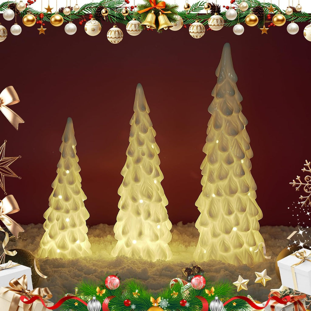 white ceramic christmas trees with lights, table top, close-up detail