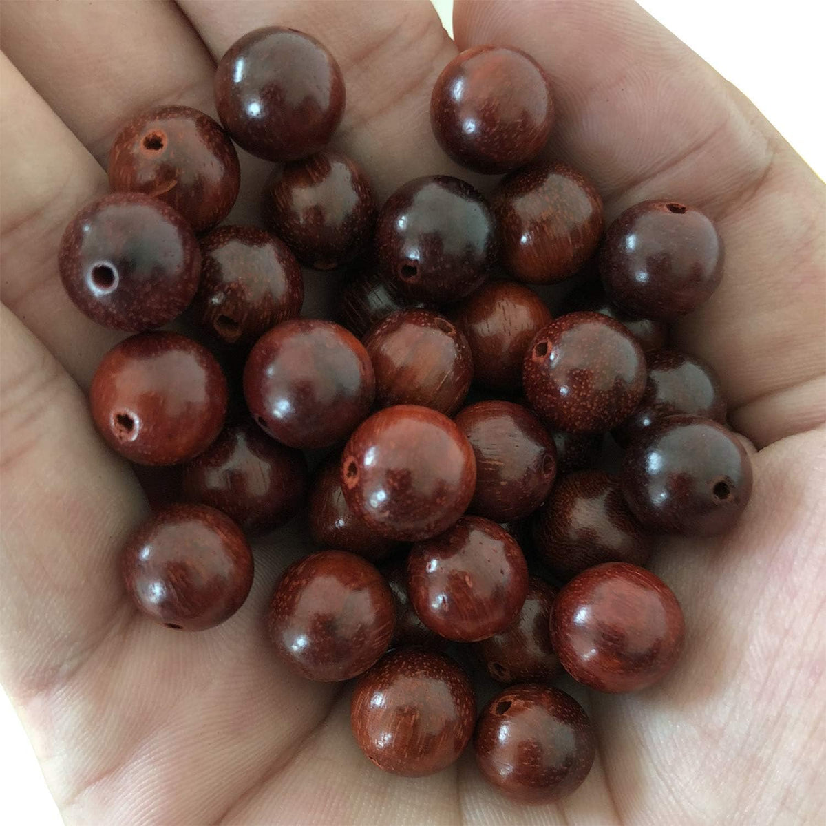 carpenterc round polished wood beads, blood sandalwood, 8mm, side view