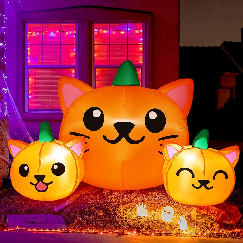 comin halloween inflatable 5ft long three pumpkin cat shown in use