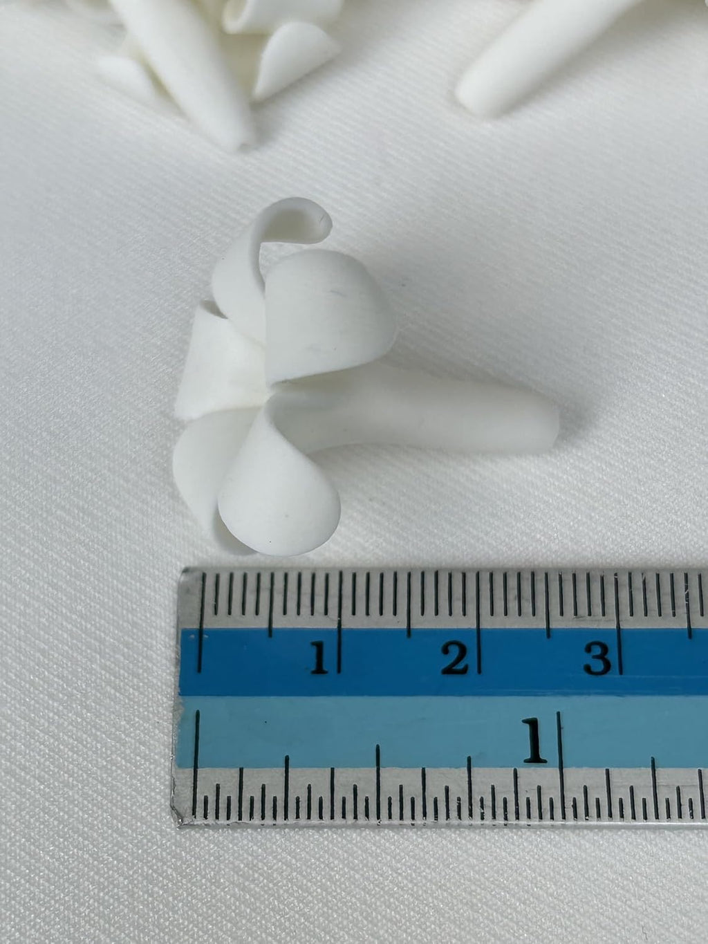 small puakenikeni (02) clay beads for jewelry making showing dimensions