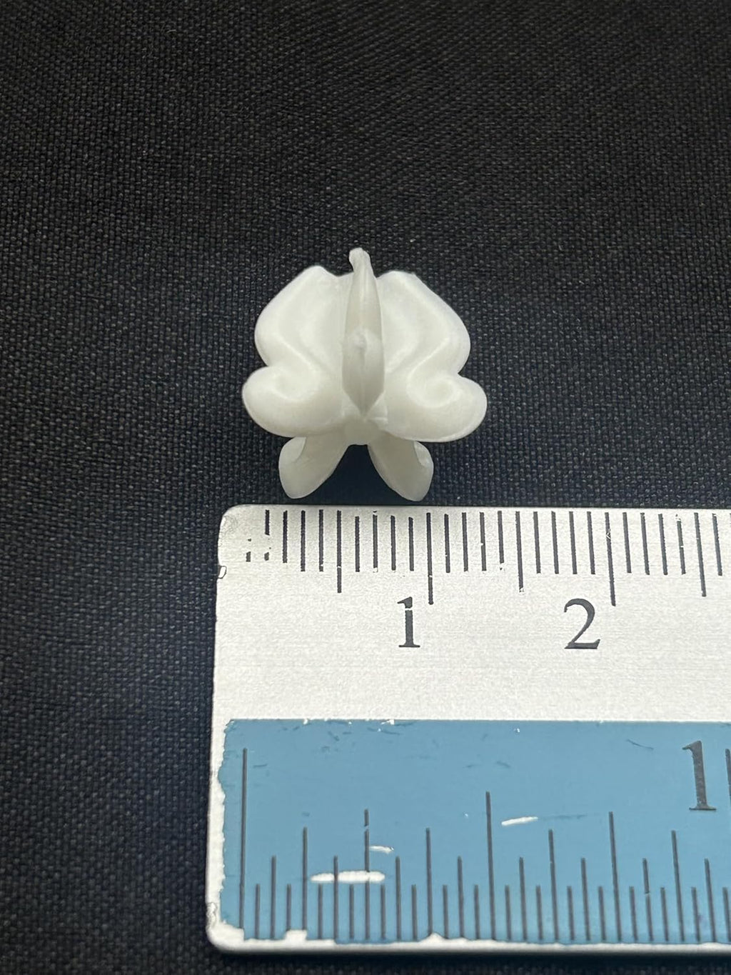 medium plastic crown flower beads for jewelry making shown in use
