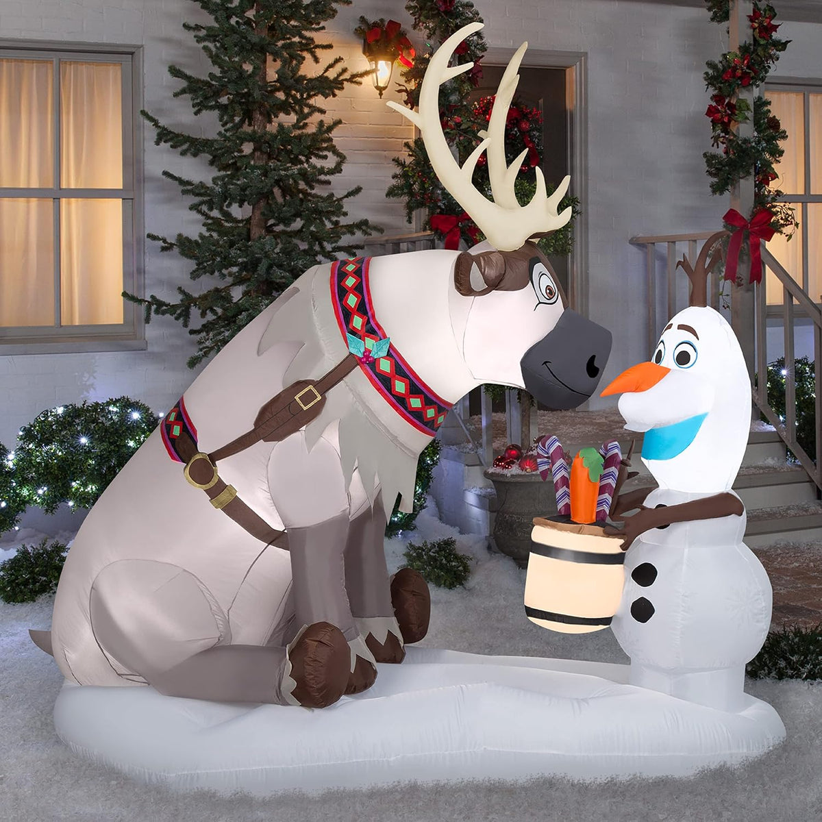 gemmy airblown inflatable olaf and sven with candy shown in use