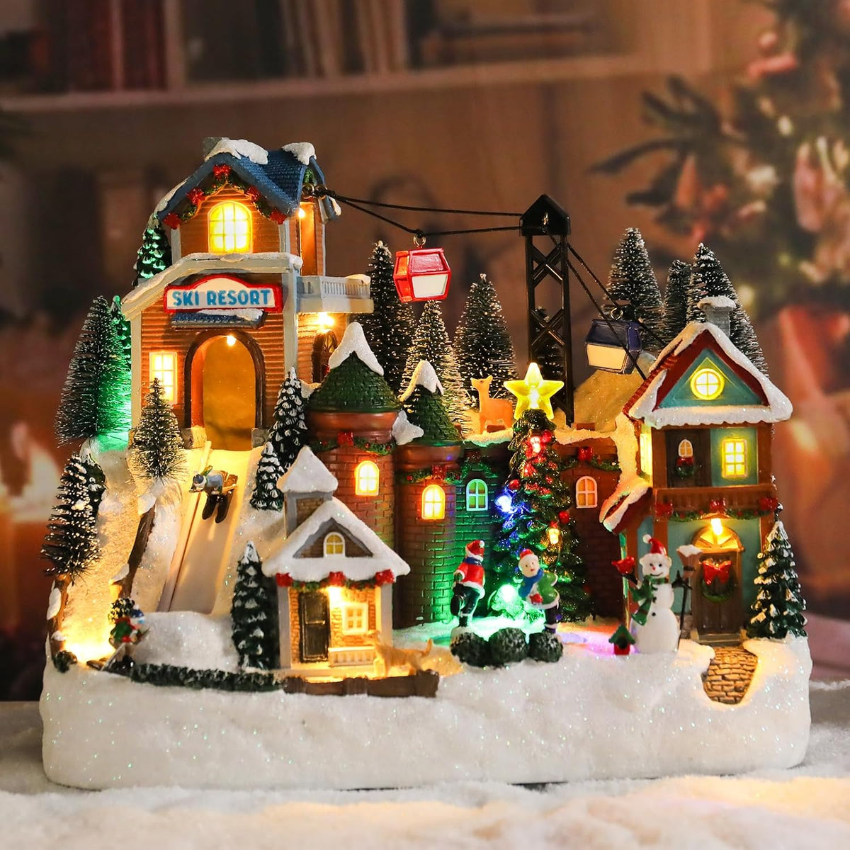Christmas Village House 10.2 Inch Christmas Decorations Skiing Skating Cable Car Village People USB Holiday Music Town Indoor Lighted Houses for Room Tabletop Xmas Decor