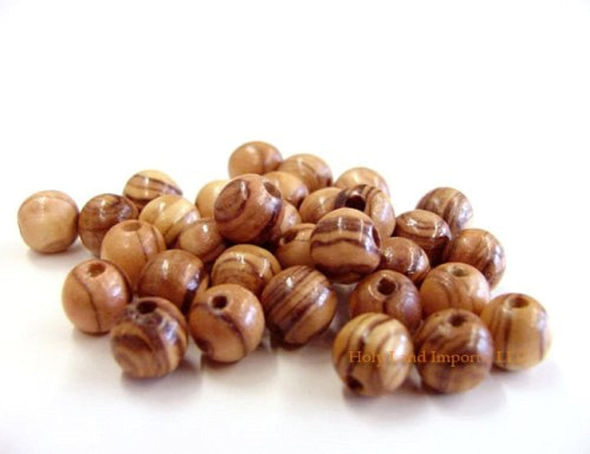 8mm - (1000 beads) olive wood beads | shown in use