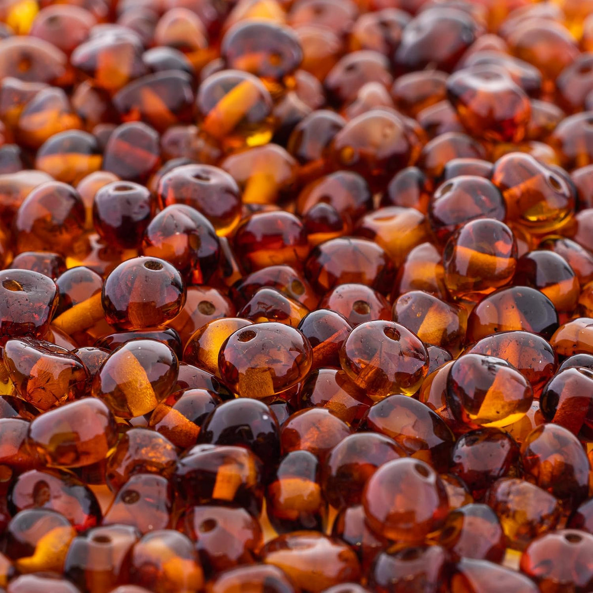 amber beads baroque style – polished and raw, side view