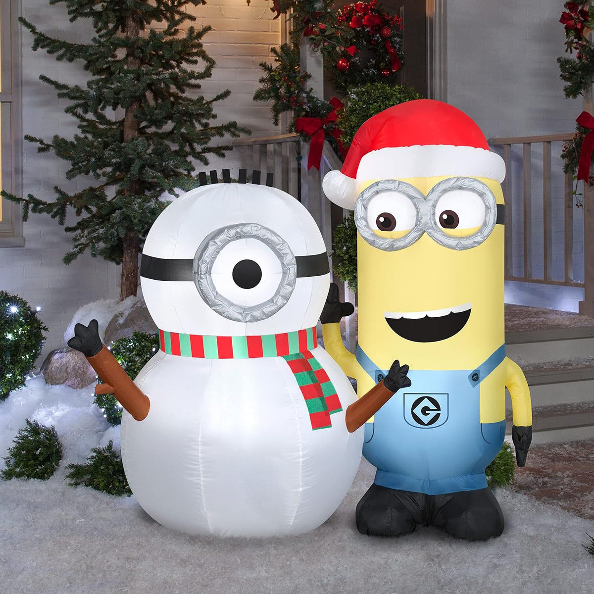 gemmy 5 ft minions kevin building snowman christmas shown in use