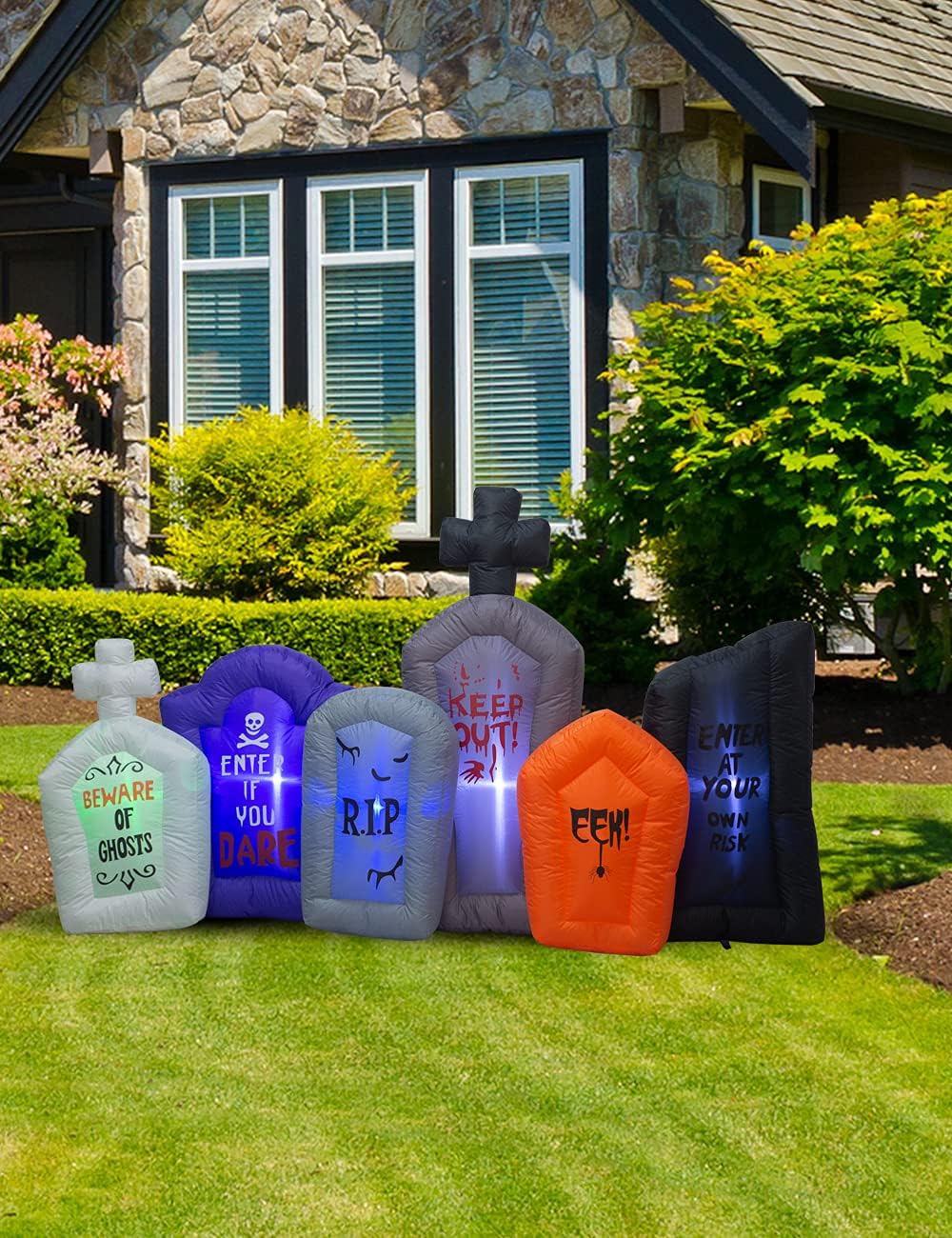 7.5 foot long halloween inflatable tombstones collection with shown in use