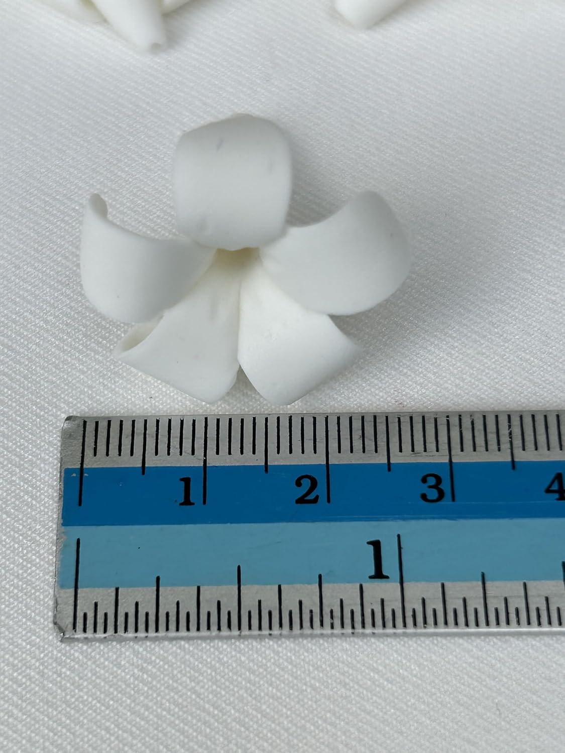small puakenikeni (02) clay beads for jewelry making, side view