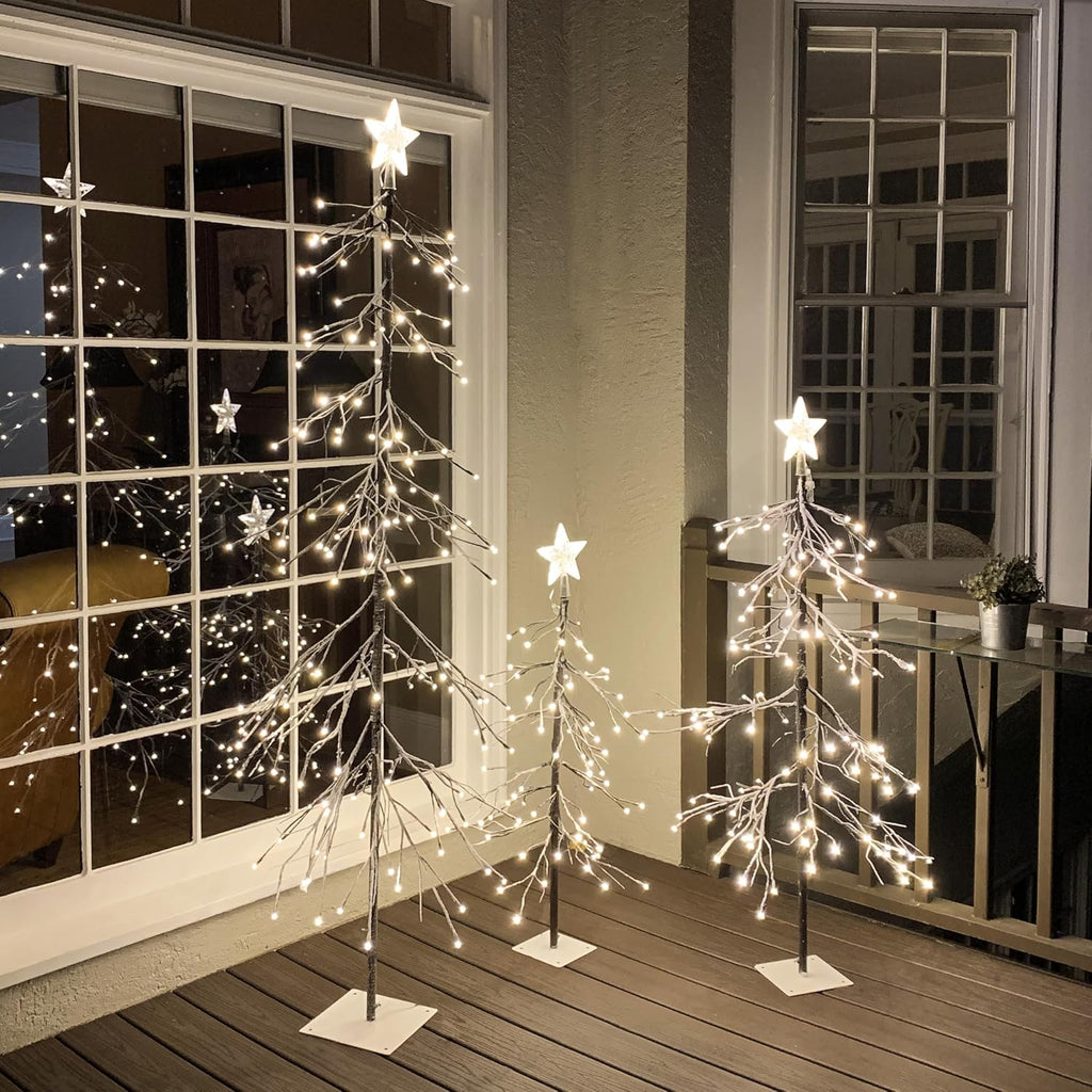 set of 3 lighted snow tree 3ft 4ft shown in use