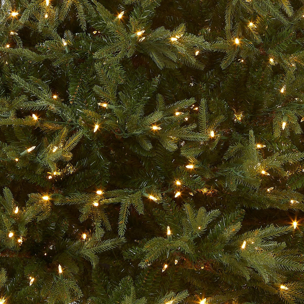national tree company 9ft pre-lit fraser grande artificial shown in use