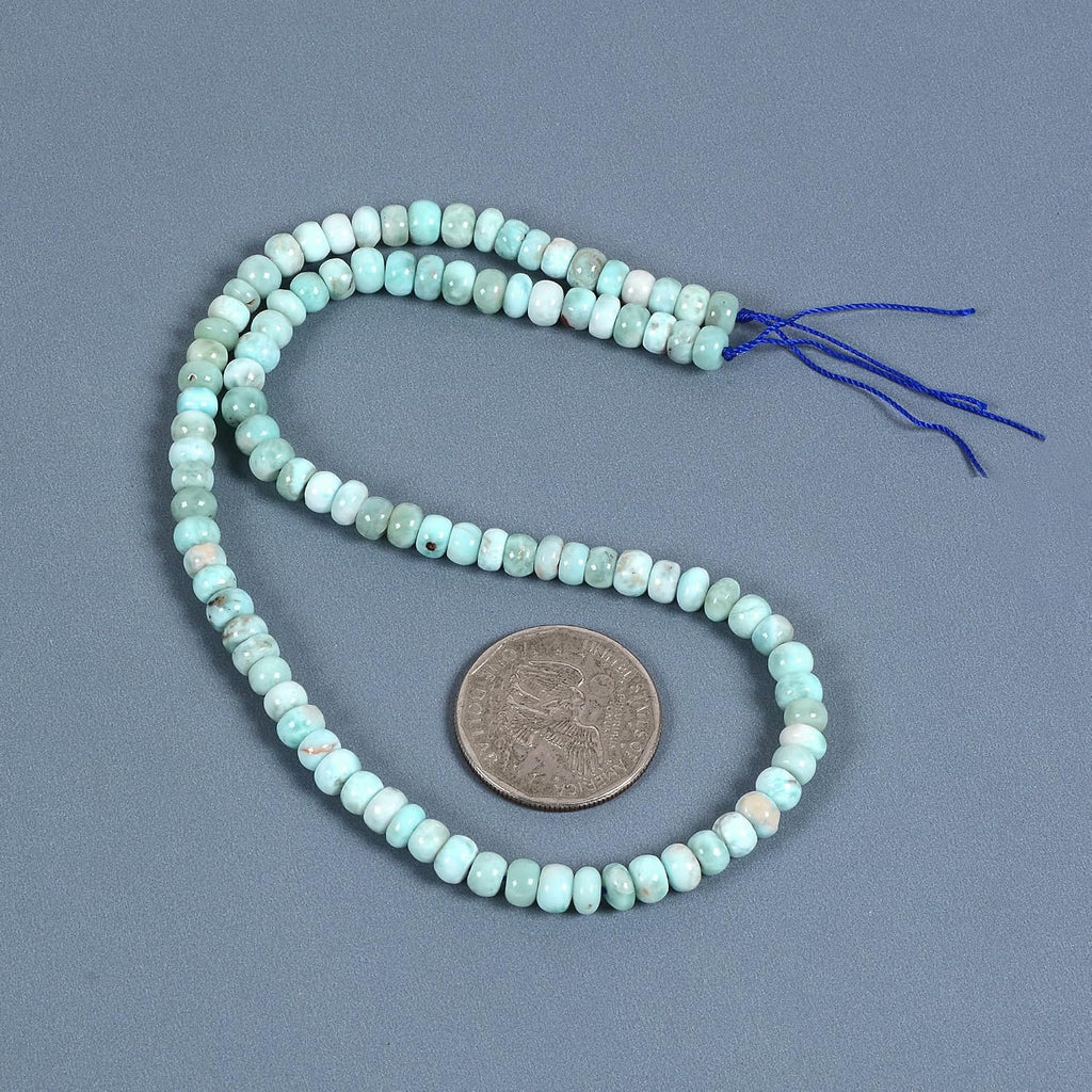 natural larimar 6mm rondelle loose beads 15 inch shown in use