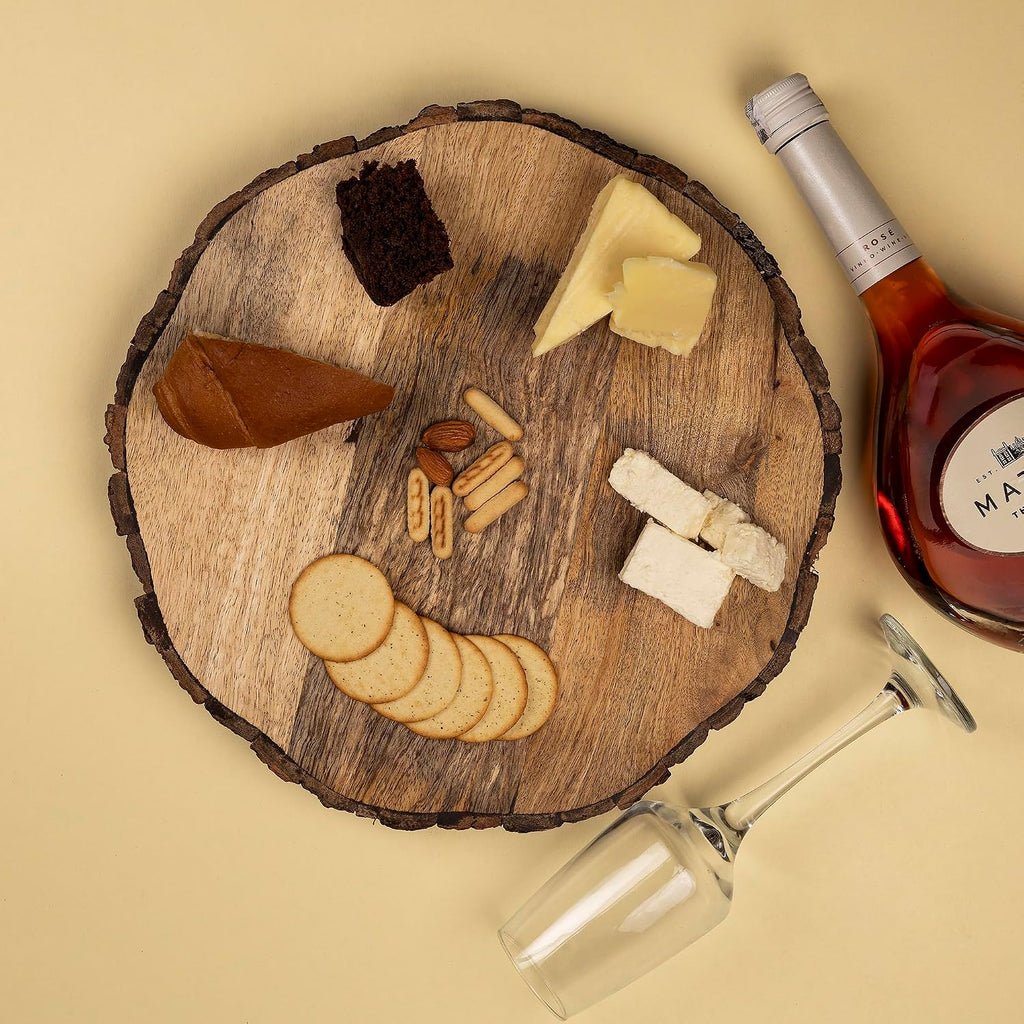 gocraft wooden round cutting board with tree bark shown in use
